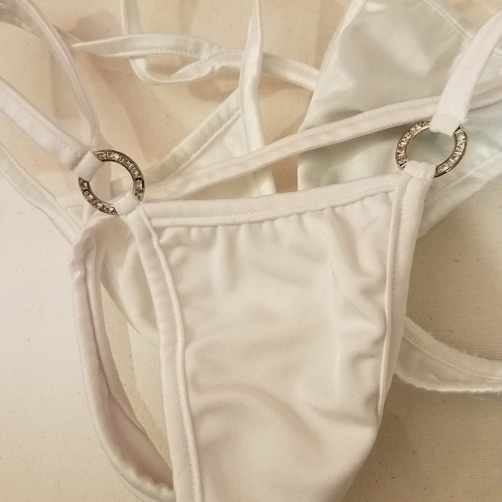 Three white thongs.